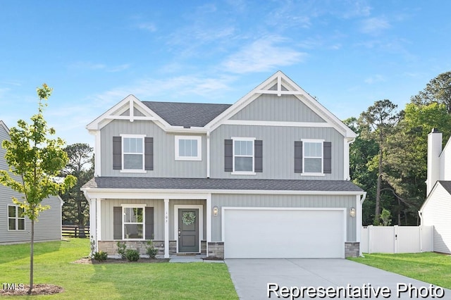 105 Mable Ct Unit 10, Lillington, NC 27546 - craftsman-style home featuring roof with shingles, concrete driveway, an attached garage, stone siding, and a porch