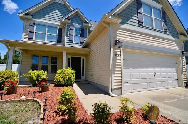 109 Red Coat Dr, Cameron, NC 28326 - view of front of house with a garage and concrete driveway
