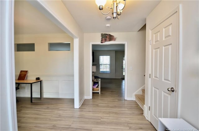 109 Red Coat Dr, Cameron, NC 28326 - hallway with a chandelier, light wood-style floors, stairway, and baseboards