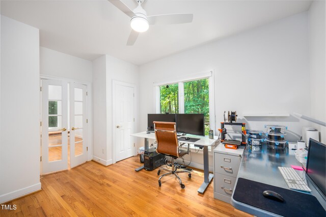 574 Chatham Dr, Chapel Hill, NC 27516 - home office with light wood-style flooring, ceiling fan, french doors, and baseboards