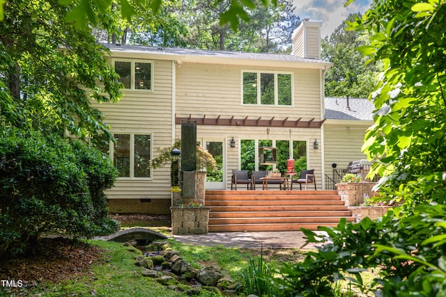 574 Chatham Dr, Chapel Hill, NC 27516 - back of house with an outdoor hangout area, a chimney, a patio area, a pergola, and a shingled roof