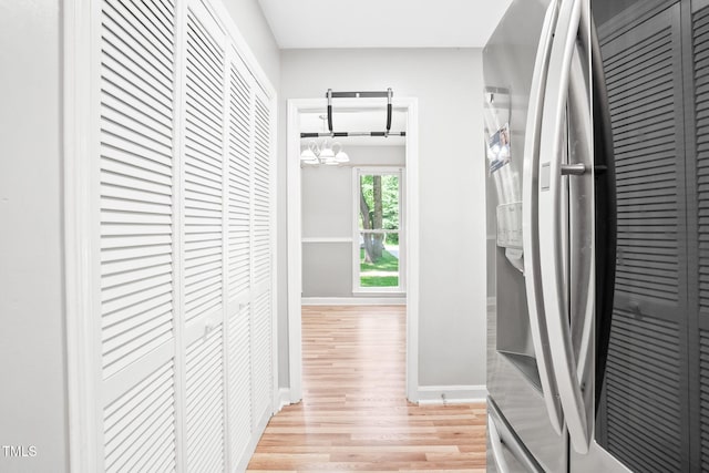 114 Bonaparte Dr, Hillsborough, NC 27278 - hall featuring light wood finished floors, a chandelier, and baseboards