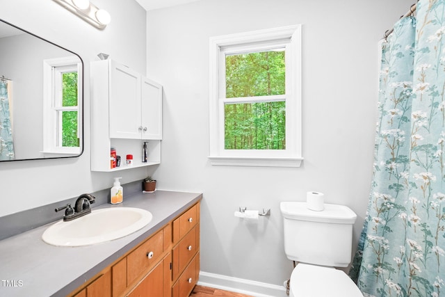 114 Bonaparte Dr, Hillsborough, NC 27278 - full bathroom with plenty of natural light, toilet, vanity, and baseboards