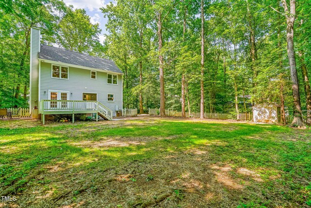 114 Bonaparte Dr, Hillsborough, NC 27278 - rear view of property featuring a chimney, a deck, and stairs