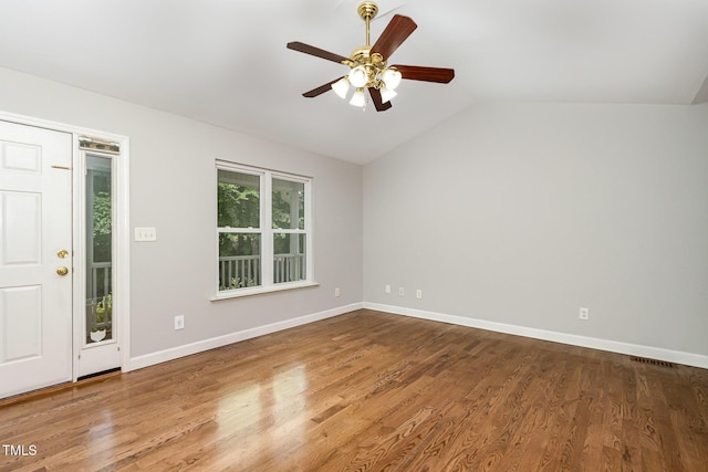 2805 Evans St, Durham, NC 27705 - spare room featuring lofted ceiling, a ceiling fan, baseboards, and wood finished floors