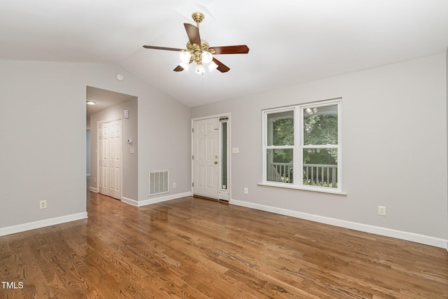 2805 Evans St, Durham, NC 27705 - empty room featuring ceiling fan, vaulted ceiling, wood finished floors, and baseboards