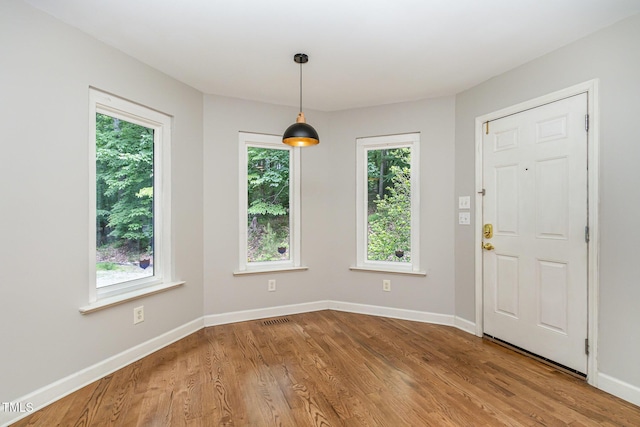 2805 Evans St, Durham, NC 27705 - entrance foyer featuring wood finished floors and baseboards
