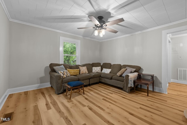 1105 Hawthorne Ln, Burlington, NC 27215 - living room featuring light wood-type flooring, baseboards, a ceiling fan, and crown molding