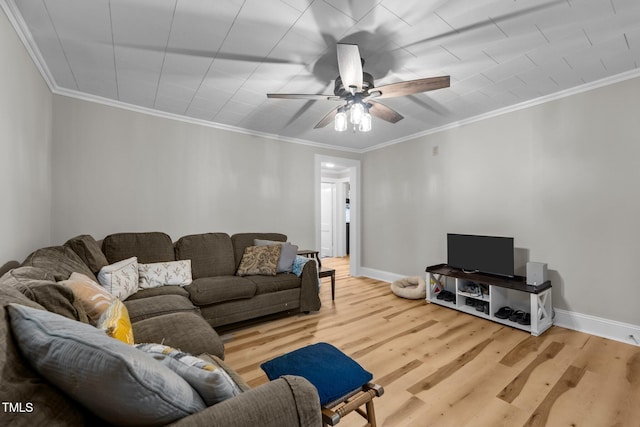 1105 Hawthorne Ln, Burlington, NC 27215 - living room featuring wood finished floors, a ceiling fan, baseboards, and ornamental molding