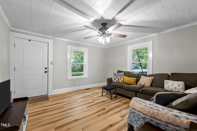 1105 Hawthorne Ln, Burlington, NC 27215 - living room featuring light wood-style floors, ornamental molding, a ceiling fan, and baseboards
