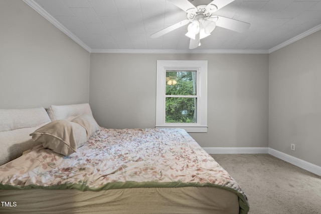 1105 Hawthorne Ln, Burlington, NC 27215 - carpeted bedroom featuring ornamental molding, baseboards, and a ceiling fan