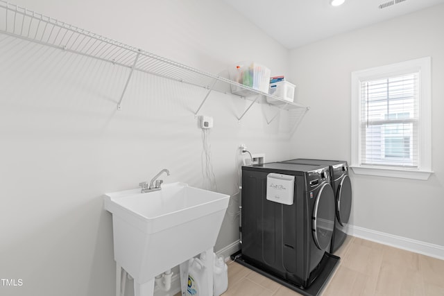 279 Edge Of Auburn Blvd, Raleigh, NC 27610 - washroom with washing machine and dryer, baseboards, and recessed lighting