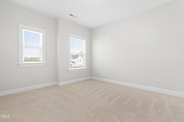 279 Edge Of Auburn Blvd, Raleigh, NC 27610 - unfurnished room with light carpet and baseboards
