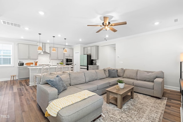 279 Edge Of Auburn Blvd, Raleigh, NC 27610 - living area with recessed lighting, a ceiling fan, wood finished floors, ornamental molding, and baseboards