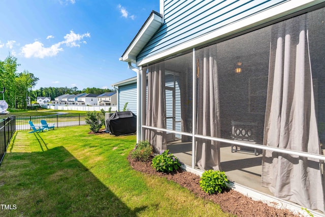 279 Edge Of Auburn Blvd, Raleigh, NC 27610 - view of yard featuring a sunroom and a residential view