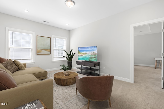 279 Edge Of Auburn Blvd, Raleigh, NC 27610 - living area with baseboards and light colored carpet