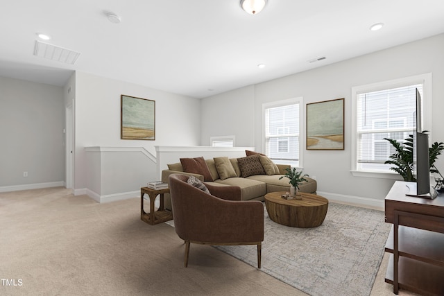 279 Edge Of Auburn Blvd, Raleigh, NC 27610 - living area featuring light colored carpet, baseboards, and recessed lighting
