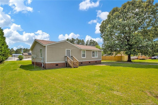 6131 Twiggs Ct, Hope Mills, NC 28348 - back of property featuring crawl space and entry steps