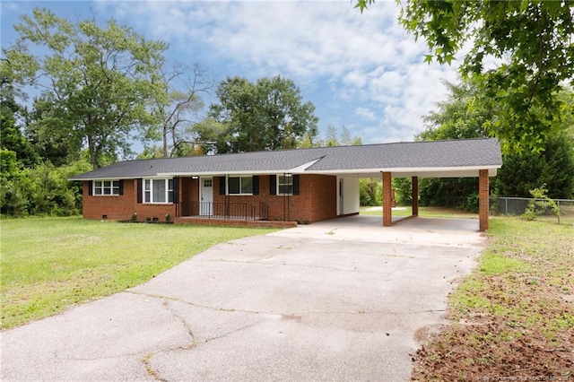 408 Harril Cir, Spring Lake, NC 28390 - ranch-style home with an attached carport, driveway, brick siding, and covered porch
