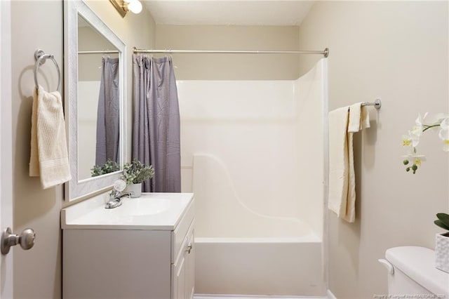408 Harril Cir, Spring Lake, NC 28390 - bathroom with toilet, vanity, and shower / bath combination with curtain