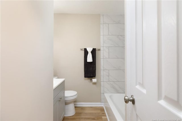 408 Harril Cir, Spring Lake, NC 28390 - bathroom featuring vanity, toilet, baseboards, and wood finished floors