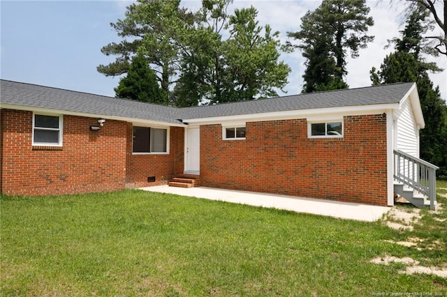 408 Harril Cir, Spring Lake, NC 28390 - back of house with entry steps, brick siding, a lawn, crawl space, and a shingled roof