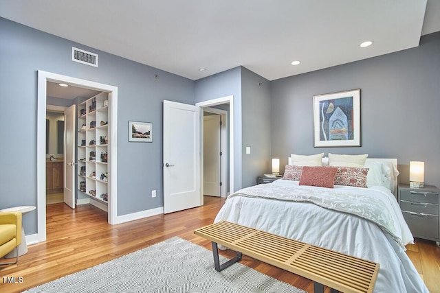 601 W Rosemary St Unit 416, Chapel Hill, NC 27516 - bedroom with wood finished floors and baseboards