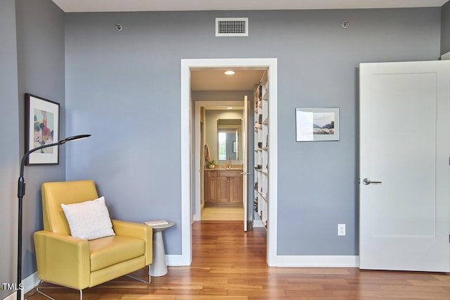 601 W Rosemary St Unit 416, Chapel Hill, NC 27516 - living area featuring wood finished floors, baseboards, and recessed lighting
