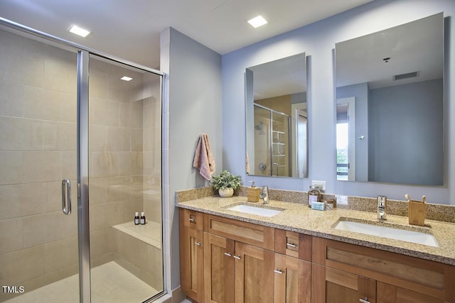 601 W Rosemary St Unit 416, Chapel Hill, NC 27516 - full bathroom with double vanity and a stall shower