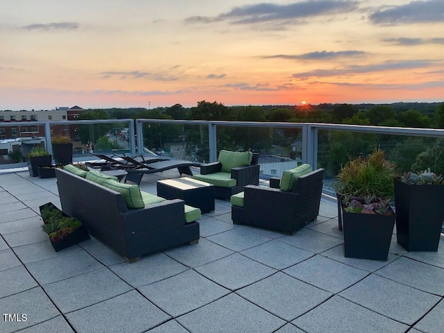 601 W Rosemary St Unit 416, Chapel Hill, NC 27516 - patio terrace at dusk with an outdoor living space and a patio area