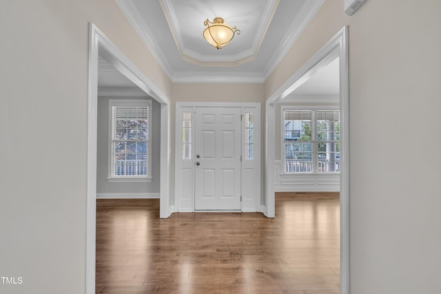 805 Alden Bridge Dr, Cary, NC 27519 - entryway featuring wood finished floors, crown molding, and baseboards
