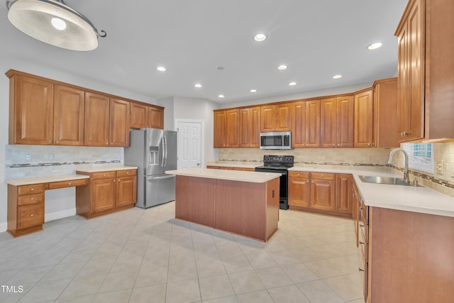 805 Alden Bridge Dr, Cary, NC 27519 - kitchen featuring appliances with stainless steel finishes, a sink, tasteful backsplash, light countertops, and recessed lighting