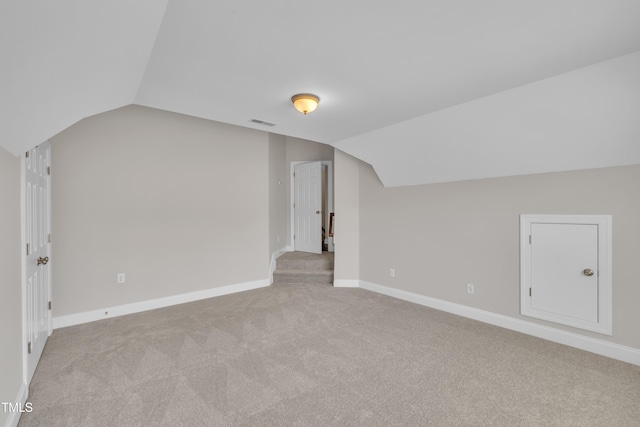 805 Alden Bridge Dr, Cary, NC 27519 - additional living space featuring lofted ceiling, carpet floors, and baseboards