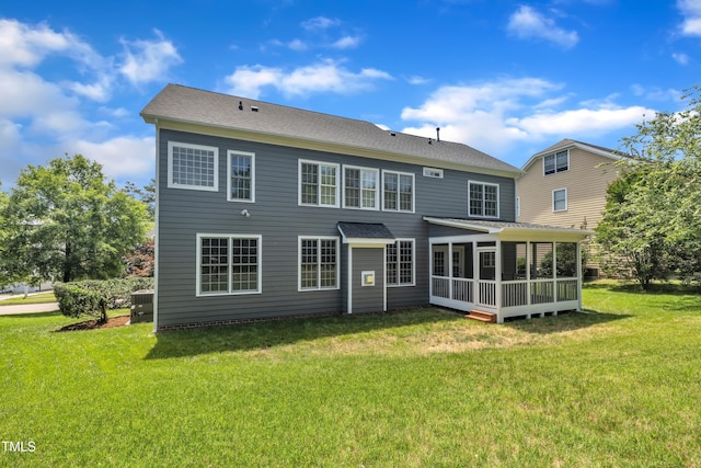 805 Alden Bridge Dr, Cary, NC 27519 - rear view of property with a sunroom, a yard, and roof with shingles