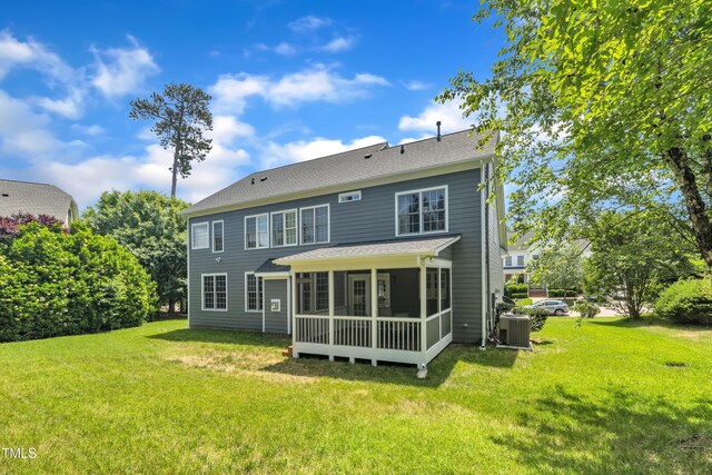 805 Alden Bridge Dr, Cary, NC 27519 - back of property with central AC, a lawn, and a sunroom