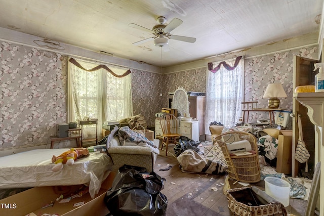 903 Nicholas St, Henderson, NC 27536 - bedroom featuring wallpapered walls, wood-type flooring, and ceiling fan