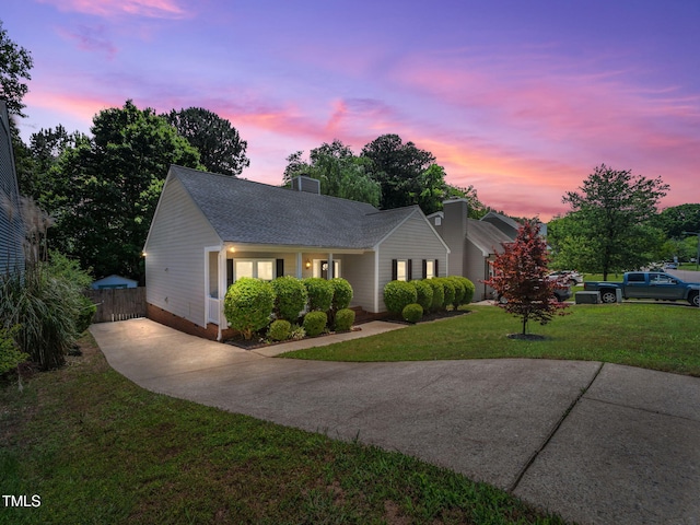 8312 Bellingham Cir, Raleigh, NC 27615 - ranch-style house featuring driveway and a chimney