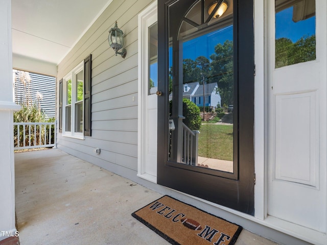 8312 Bellingham Cir, Raleigh, NC 27615 - doorway to property featuring a porch