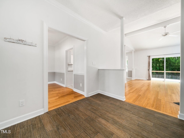 8312 Bellingham Cir, Raleigh, NC 27615 - empty room with wood finished floors, ceiling fan, baseboards, and ornamental molding