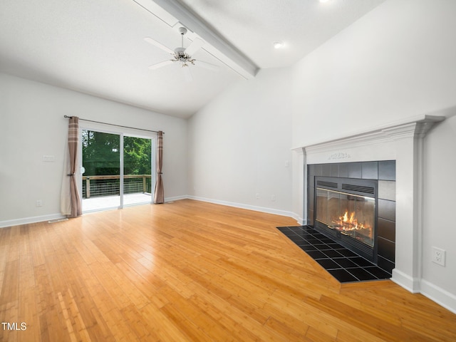 8312 Bellingham Cir, Raleigh, NC 27615 - unfurnished living room with a tile fireplace, hardwood / wood-style floors, ceiling fan, and baseboards