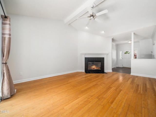 8312 Bellingham Cir, Raleigh, NC 27615 - unfurnished living room with a fireplace, ceiling fan, light wood-style flooring, and baseboards