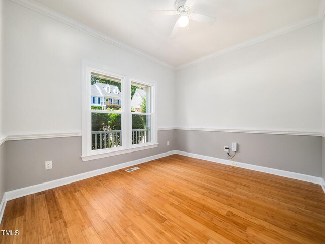 8312 Bellingham Cir, Raleigh, NC 27615 - unfurnished room with light wood-style floors, baseboards, ornamental molding, and ceiling fan