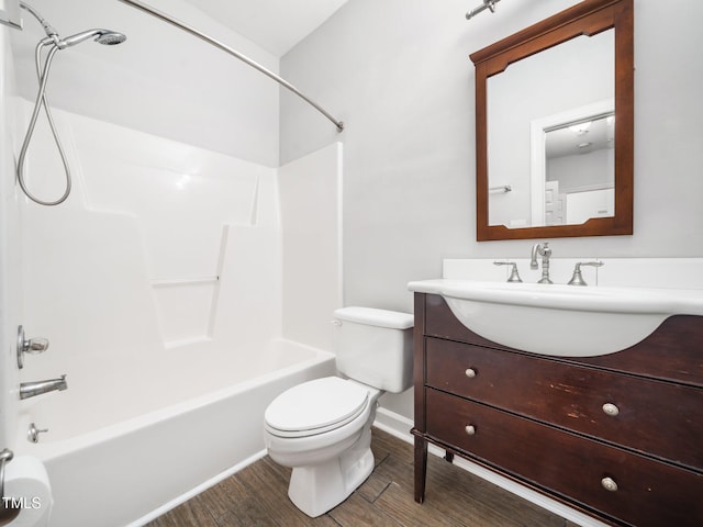 8312 Bellingham Cir, Raleigh, NC 27615 - bathroom featuring shower / washtub combination, toilet, vanity, and baseboards