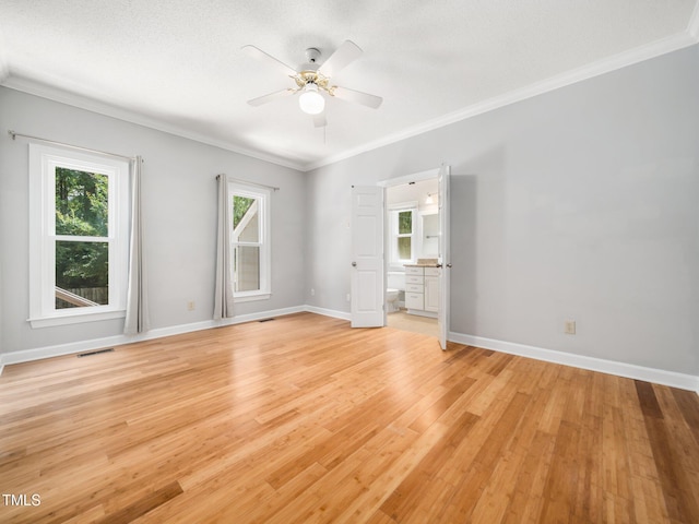 8312 Bellingham Cir, Raleigh, NC 27615 - spare room with ornamental molding, ceiling fan, light wood finished floors, and baseboards