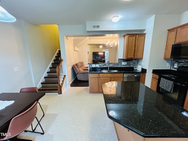 510 Berry Chase Way, Cary, NC 27519 - kitchen with black appliances, a sink, backsplash, and brown cabinets