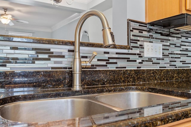 510 Berry Chase Way, Cary, NC 27519 - kitchen view of a sink, crown molding, tasteful backsplash, dark countertops, and a ceiling fan