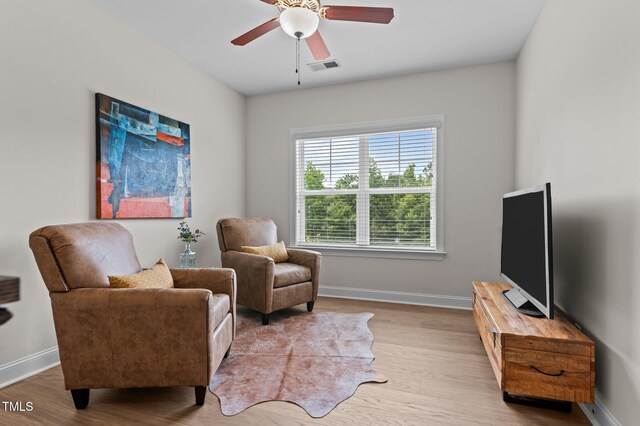 8304 Southmoor Hill Trl, Wake Forest, NC 27587 - sitting room featuring baseboards, light wood-style flooring, and a ceiling fan