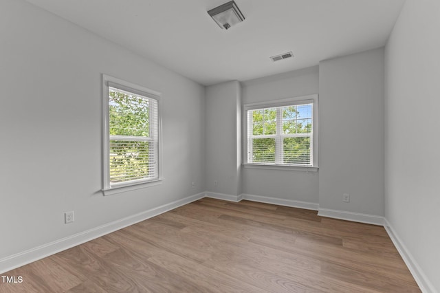 8304 Southmoor Hill Trl, Wake Forest, NC 27587 - spare room featuring light wood-style flooring and baseboards