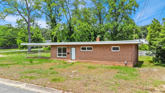 1901 Rose St, Goldsboro, NC 27530 - ranch-style home featuring brick siding and a chimney