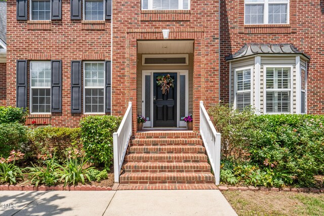203 Worsham Dr, Chapel Hill, NC 27516 - property entrance featuring brick siding